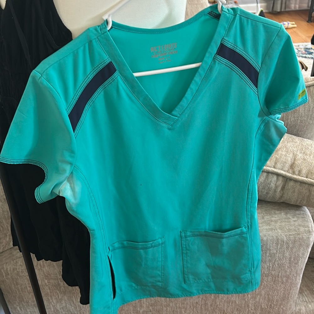 Size small set of scrubs by activate by Med couture! Like new!